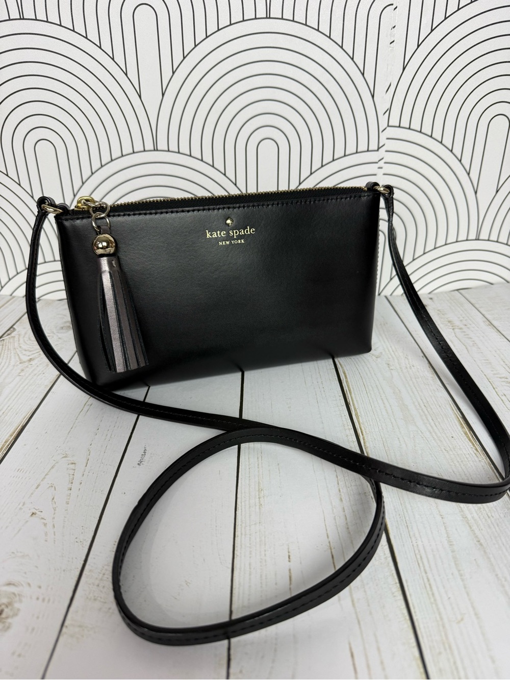 kate spade Black Leather Crossbody with Striped Tassel